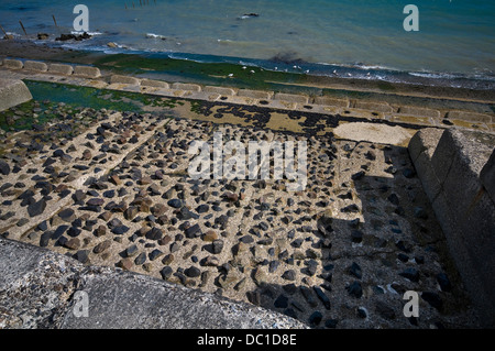 Sea defenses and old military installations at The Warren near Folkstone, Kent, UK Stock Photo