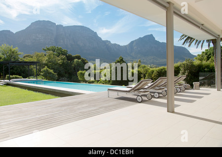 Luxury swimming pool with mountain view Stock Photo