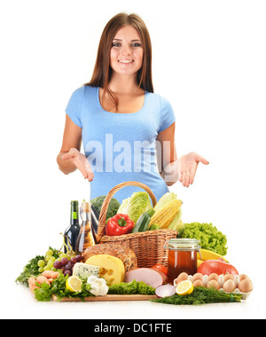 Young woman with variety of grocery products isolated on white Stock Photo