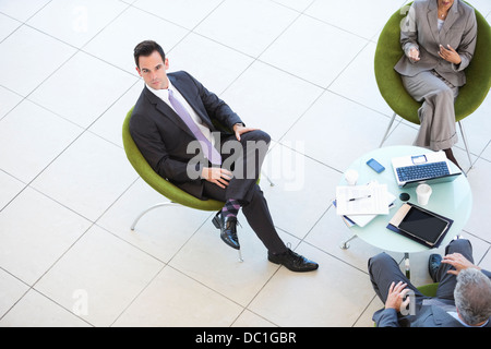 High angle portrait of businessman in meeting Stock Photo