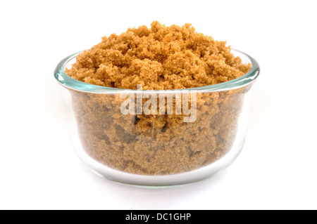 Brown Sugar in a Glass Bowl Isolated on White Stock Photo