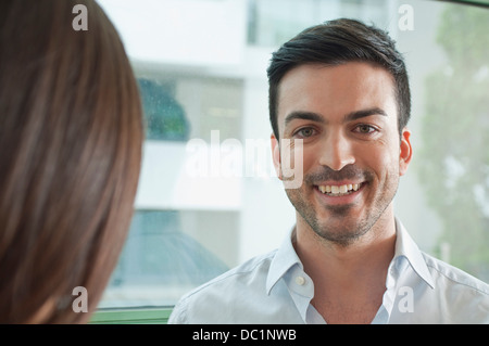 Portrait of smiling young male office worker Stock Photo