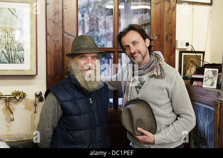 Senior and mid adult man in antique shop, portrait Stock Photo