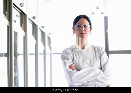 Portrait of female scientist wearing protective goggles Stock Photo