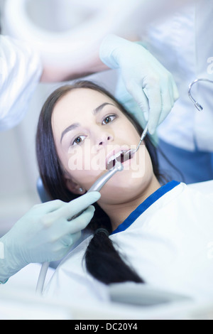 Dentist drilling patients teeth Stock Photo