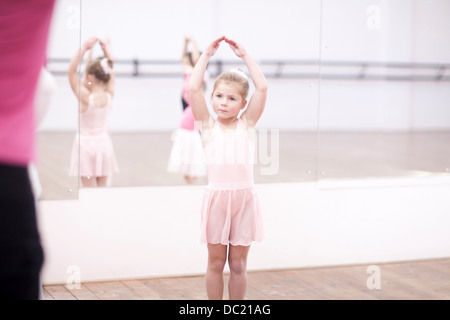 Young ballerinas posing in dance studio Stock Photo