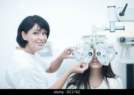 Young woman having eyes tested Stock Photo