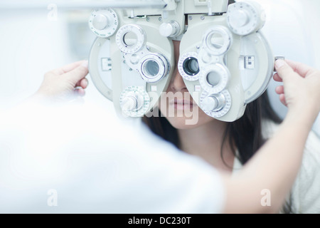 Optician testing patients sight Stock Photo