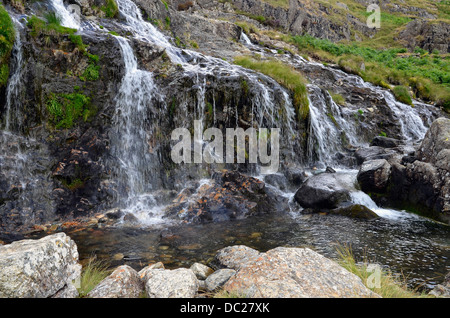 Levers Water Beck and waterfalls in Copper Mines Valley above Coniston in the  Lake District National Park Stock Photo