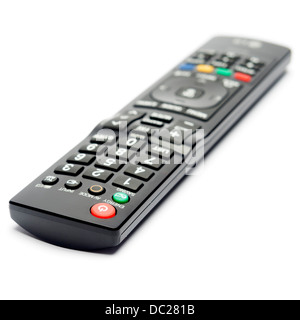 Selective focus photo of a black remote control isolated on white background Stock Photo
