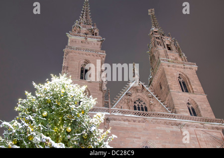 Switzerland, Basel. Winter night at the Musterplatz market with Christmas tree. Stock Photo