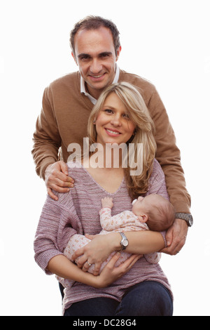 Couple with newborn baby daughter
