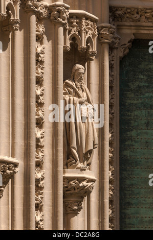 Statue of Saint Jude Thaddeus in a niche near a gate of the cathedral, Seville, Spain. Stock Photo