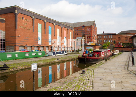 Y sports and fitness club in Castlefield, Manchester. Bridgewater Canal with boat. Museum of Science and Industry in background. Stock Photo