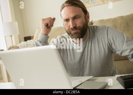 Man looking at laptop