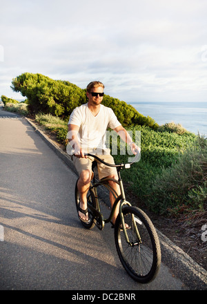Man on bicycle Stock Photo