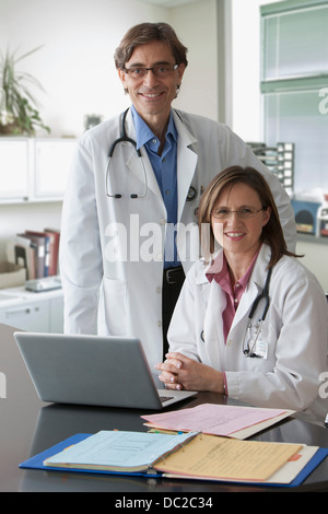 Two doctors looking at camera Stock Photo