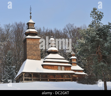 Traditional wooden church in the open air Museum of Folk Architecture and Life of Ukraine, Pyrohovo, Ukraine Stock Photo