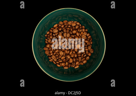 Fresh Roasted Coffee Beans in a Green Ceramic Bowl Stock Photo