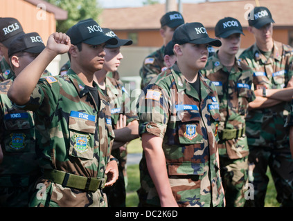 Cadets from the Michigan Wing Civil Air Patrol listen to Joint Tactical Air Controllers from the 182d Air Support Operations Group talk about there career field at Alpena Combat Readiness Training Center, Michigan, Aug. 1, 2013. The Cadets were attending Stock Photo