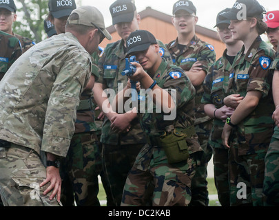 Cadets from the Michigan Wing Civil Air Patrol listen to Joint Tactical Air Controller Staff Sgt. Nathan Hruska from the 182d Ai Stock Photo