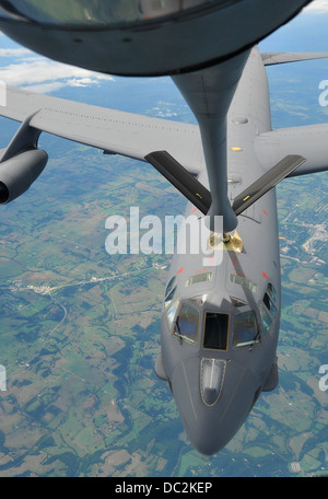 A B-52 Stratofortress from the 307th Bomb Wing, Barksdale Air Force Base, La., is positioned to take fuel from a KC-135 Stratotanker flown by the 18th Air Refueling Squadron, Air Force Reserve Command, McConnell AFB, Kan., Aug. 3, 2013, Arkansas. Air refu Stock Photo