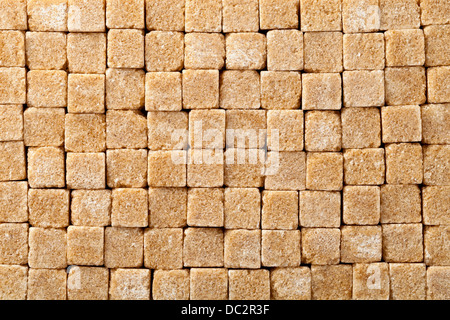 Brown sugar cubes for background. Top view Stock Photo