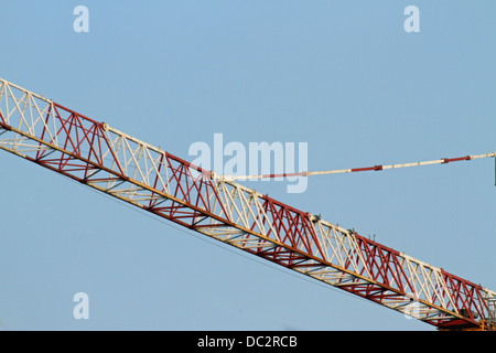 detail of a towering crane at a construction site Stock Photo