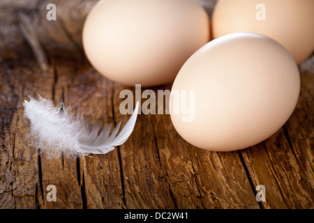 Fresh eggs on wooden table background. Copy space Stock Photo