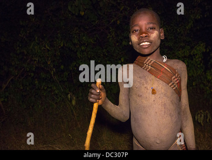 Bodi Tribe Boy During Night Ceremony Of The Kael, Hana Mursi, Omo Valley, Ethiopia Stock Photo