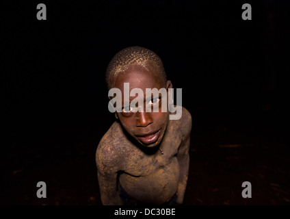 Bodi Tribe Boy During Night Ceremony Of The Kael, Hana Mursi, Omo Valley, Ethiopia Stock Photo