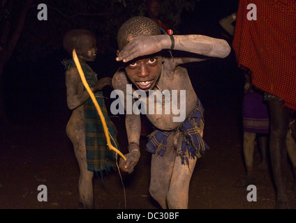 Bodi Tribe Boy During Night Ceremony Of The Kael, Hana Mursi, Omo Valley, Ethiopia Stock Photo