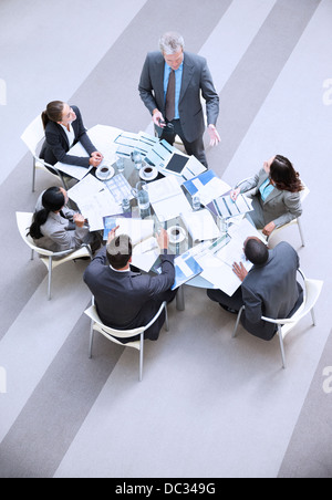 High angle view of businessman leading meeting Stock Photo
