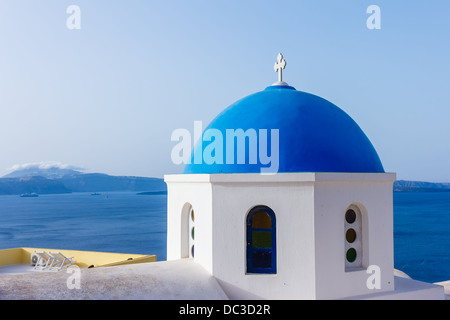 Traditional blue dome in Oia village in Santorini, Greece Stock Photo