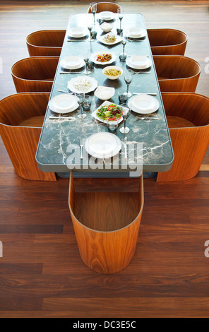 Placesettings and food on luxury table