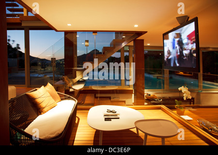 Flat screen TV in modern living room Stock Photo