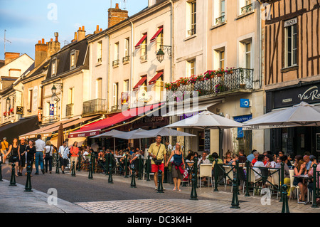 Early evening diners and people strolling through the town of Amboise, in the Indre-et-Loire department in central France. Stock Photo