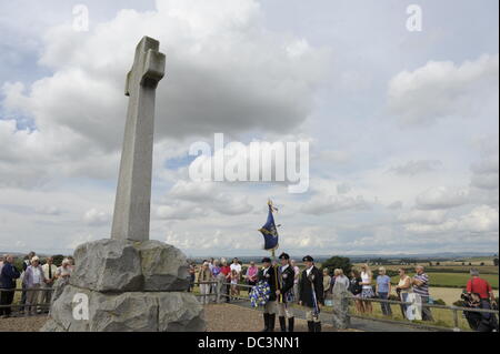 Flodden, Coldstream, Scotland, UK. 8th August 2013.  Coldstream Civic Week Flodden Rideout, Coldstreamer Grant Campbell and left-hand man Liam Wallis  and Colin Leifer right-hand man at the Memorial at Flodden to lay a wreath in memory of the fallen.  Credit:  Rob Gray/Alamy Live News Stock Photo