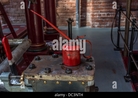 Engineers Red oil can in workshop Stock Photo