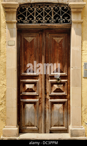 Old door facade in city of Rethymno, Crete, Greece Stock Photo