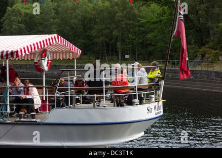 Passengers on board pleasure steamer 'Sir Walter Scott' ready to depart from the Trossachs Pier on Loch Katrine Scotland Stock Photo