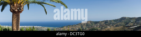 A panoramic view looking towards Nerja from the hills above Frigiliana in Andalusia, southern Spain. Stock Photo