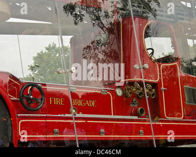 Leyland, Lancashire, UK 8th August 2013. Last surviving 1938 Leyland TL Fire Engine, named Norma, unveiled for the first time in its new purpose built glass case as part of the Leyland Gateway Project in front of invited guests. © Sue Burton/Alamy News Stock Photo