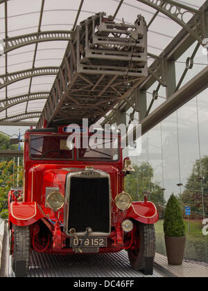 Leyland, Lancashire, UK 8th August 2013. Last surviving 1938 Leyland TL Fire Engine, named Norma, unveiled for the first time in its new purpose built glass case as part of the Leyland Gateway Project in front of invited guests. © Sue Burton/Alamy News Stock Photo