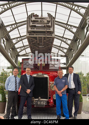 Leyland, Lancashire, UK 8th August 2013. Last surviving 1938 Leyland TL Fire Engine, named Norma, unveiled for the first time in its new purpose built glass case as part of the Leyland Gateway Project in front of invited guests. © Sue Burton/Alamy News Stock Photo