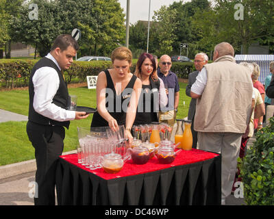 Leyland, Lancashire, UK 8th August 2013. Hotel Staff Welcoming Invited Guests to the unveiling of the last surviving 1938 Leyland TL Fire Engine as part of the Leyland Gateway Project. © Sue Burton/Alamy News Stock Photo