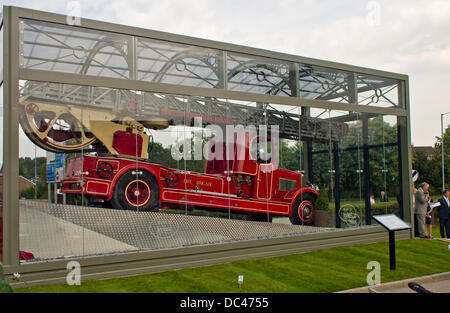 Leyland, Lancashire, UK 8th August 2013. Last surviving 1938 Leyland TL Fire Engine, named Norma, unveiled for the first time in its new purpose built glass case as part of the Leyland Gateway Project in front of invited guests. © Sue Burton/Alamy News Stock Photo