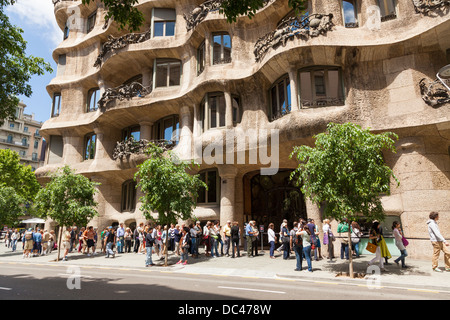 visitors queuing outside La Pedrera in Barcelona Stock Photo