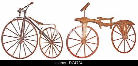 Old wooden bicycle isolated on white background Stock Photo