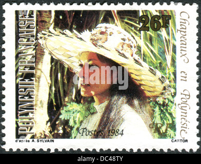 FRENCH POLYNESIA - CIRCA 1984: A postage stamp printed in French Polynesia, shows a hat Ofe Fei, circa 1984 Stock Photo